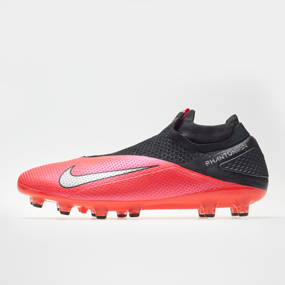 pink football boots astro turf