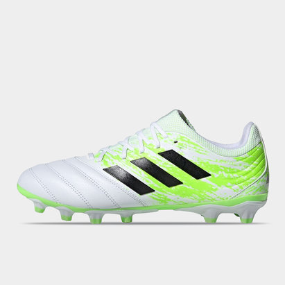 white and green adidas football boots